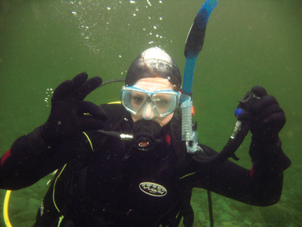 EXPLORING LOCAL WATERS: Local nurse Eilish Murphy is a recently certified scuba diver, here exploring the emerald waters of Saltery Bay.